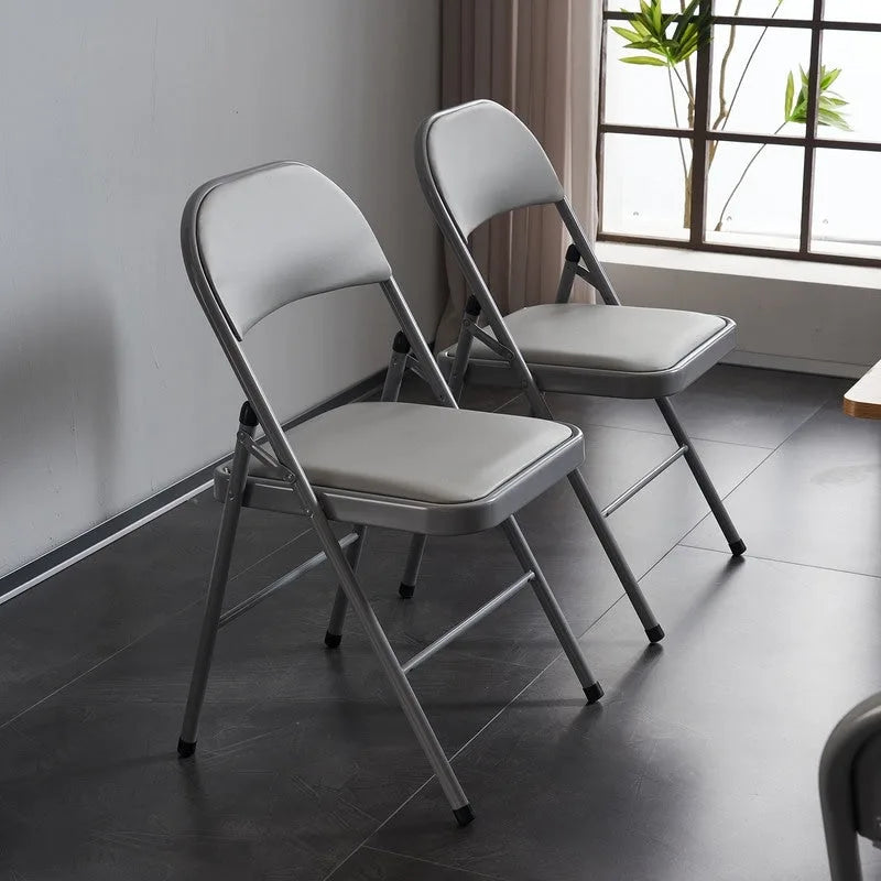 Chaises pliantes élégantes en fer et PVC pour conventions et expositions Blanches