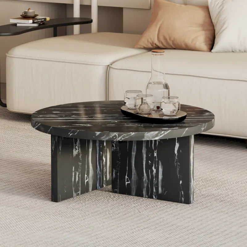 A white MDF material circular patterned coffee table suitable for small spaces and living rooms.