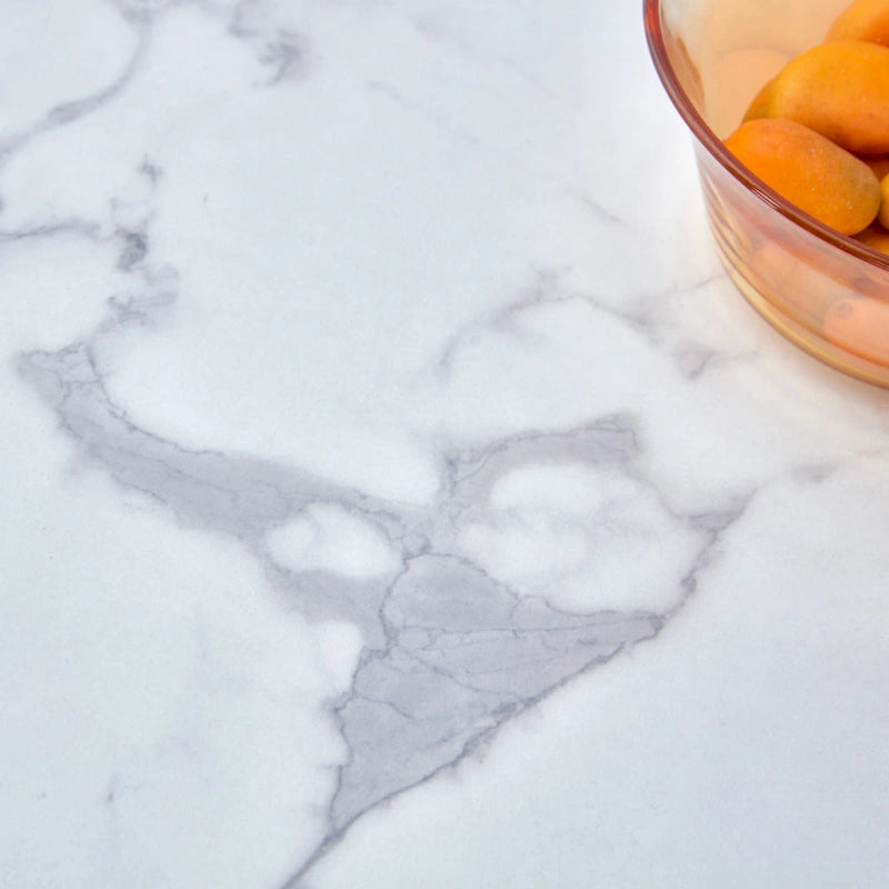 A white MDF material circular patterned coffee table suitable for small spaces and living rooms.